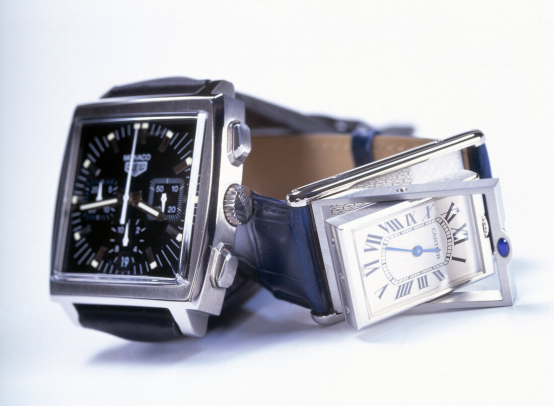 Damen/Herren Armbanduhr in klassischer Form.