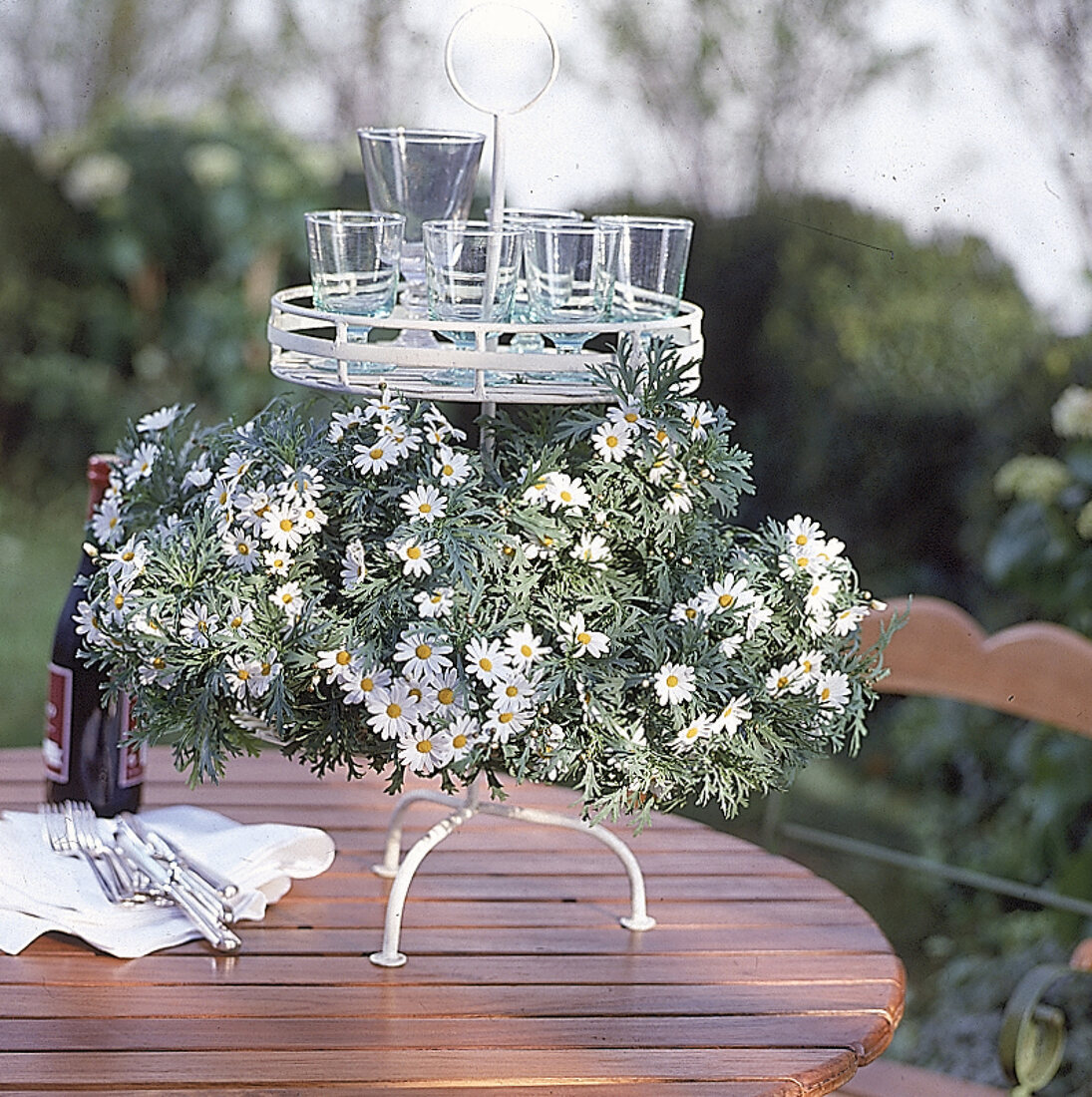 White lacquered etagere with bush margarites and glasses