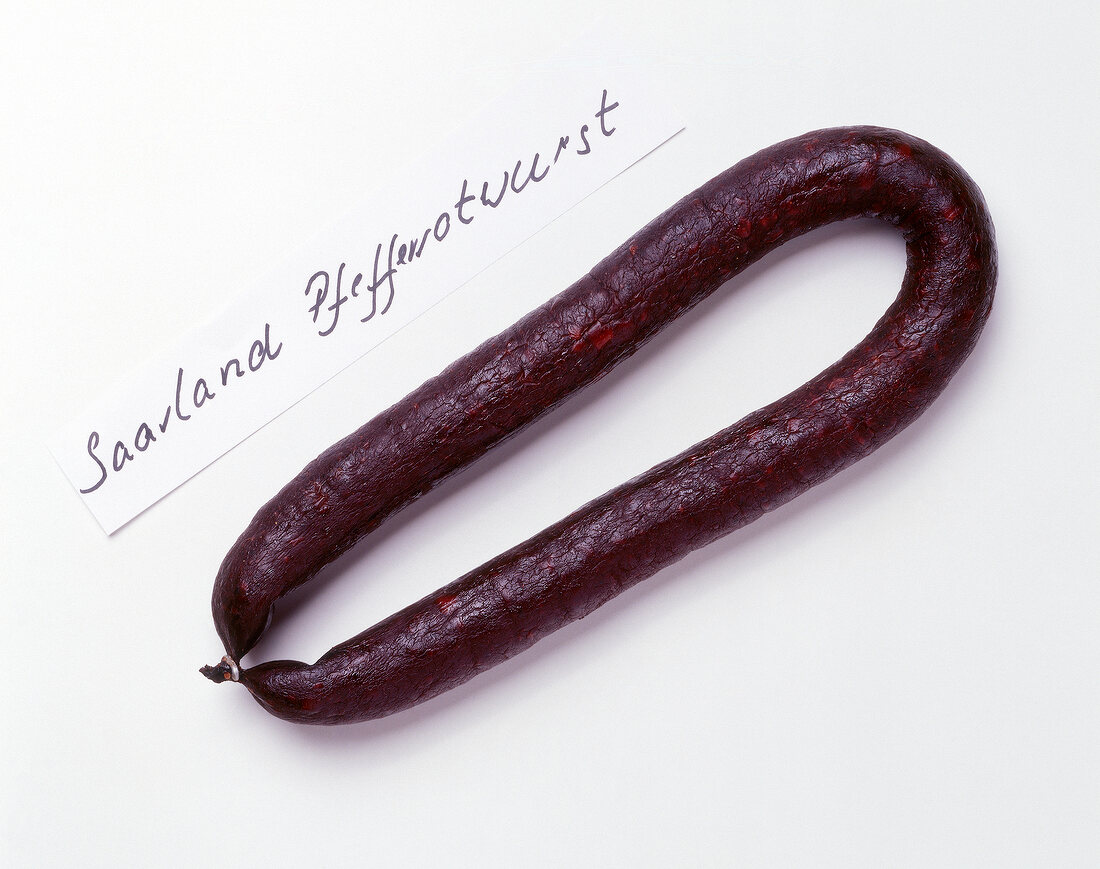 Chili sausage on white background