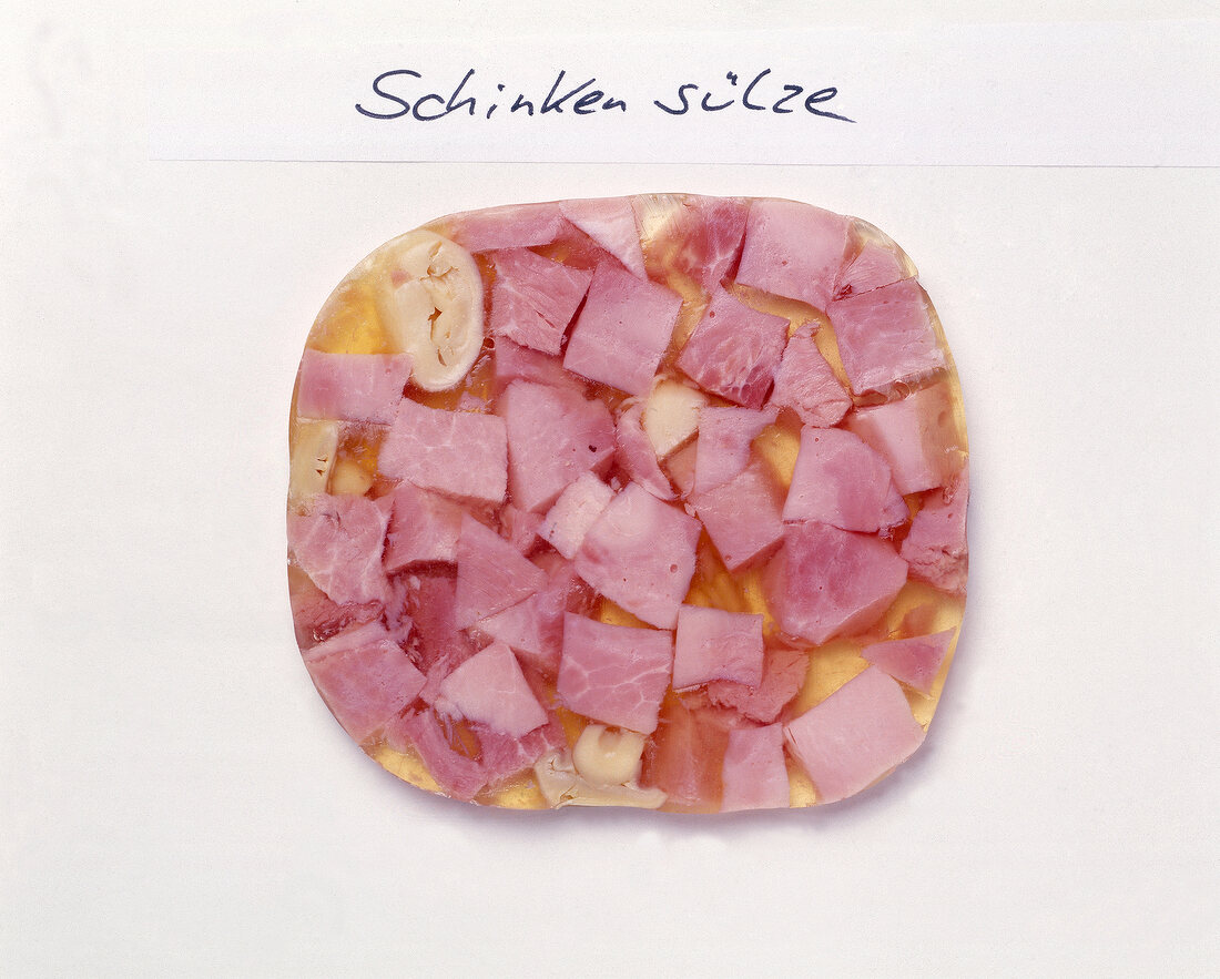 Chopped ham with jelly on white background