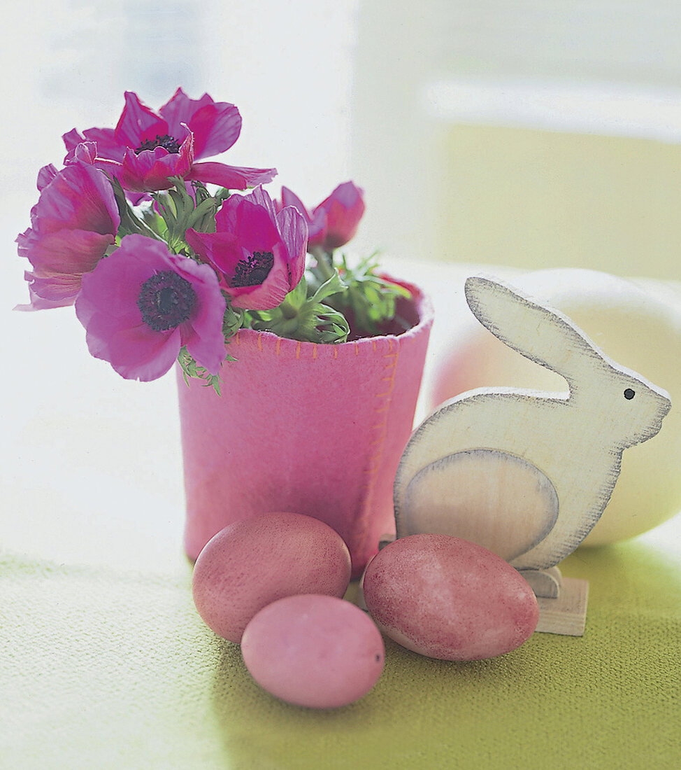Three pink eggs, poppies with felt planter and a white wooden rabbit