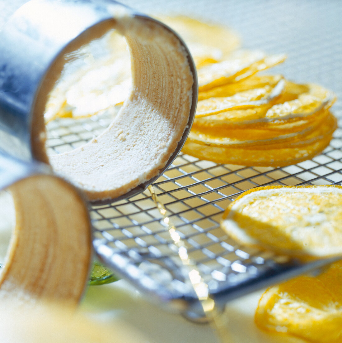 Close-up of preparation on charlotte tree cake with candied orange slices