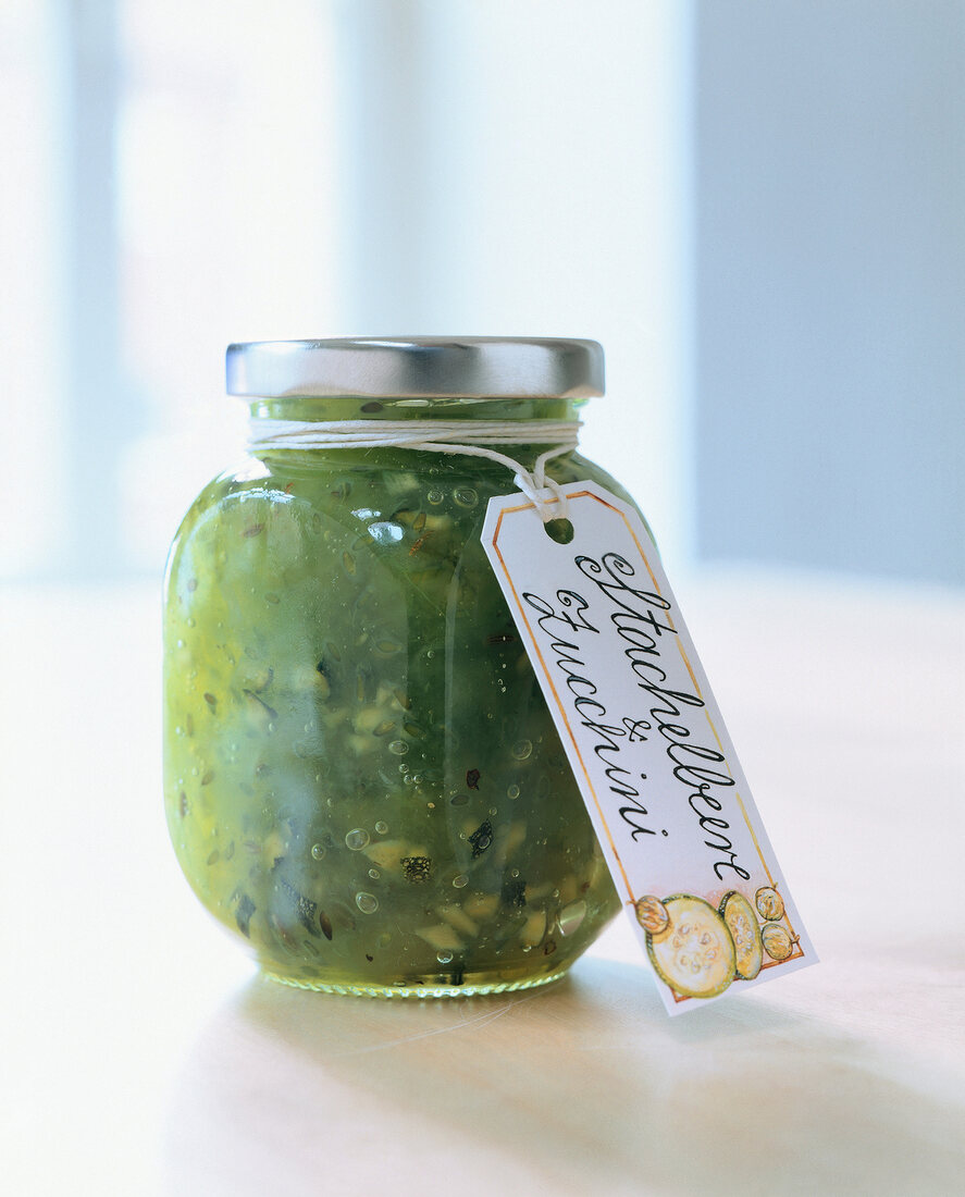 Close-up of a jar of gooseberry zucchini jam