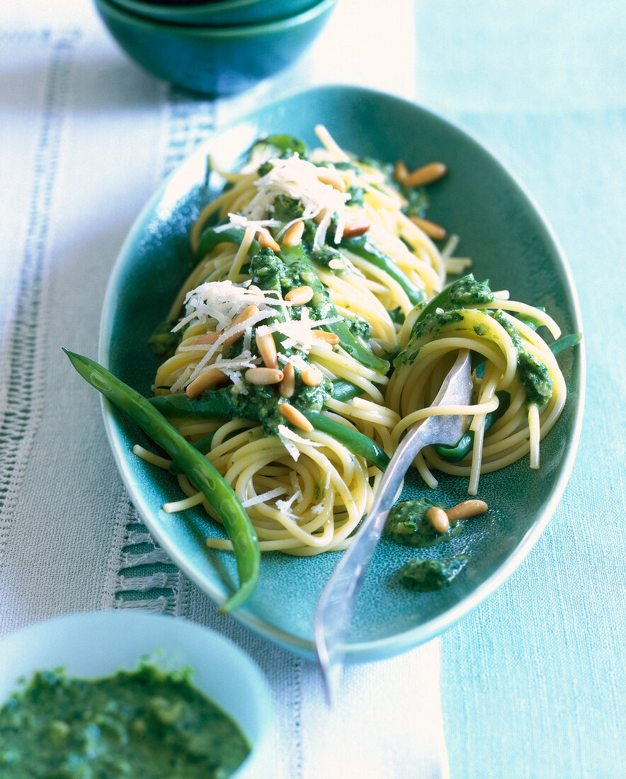 Spaghetti with beans blue serving dish