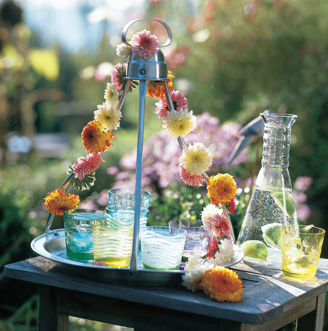 Hanging tray with flower garland with water glasses