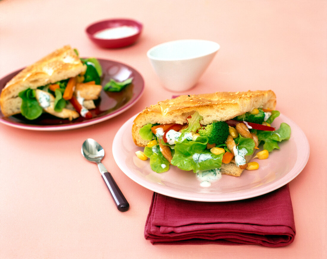 Turkey kebab with yoghurt dressing on plate