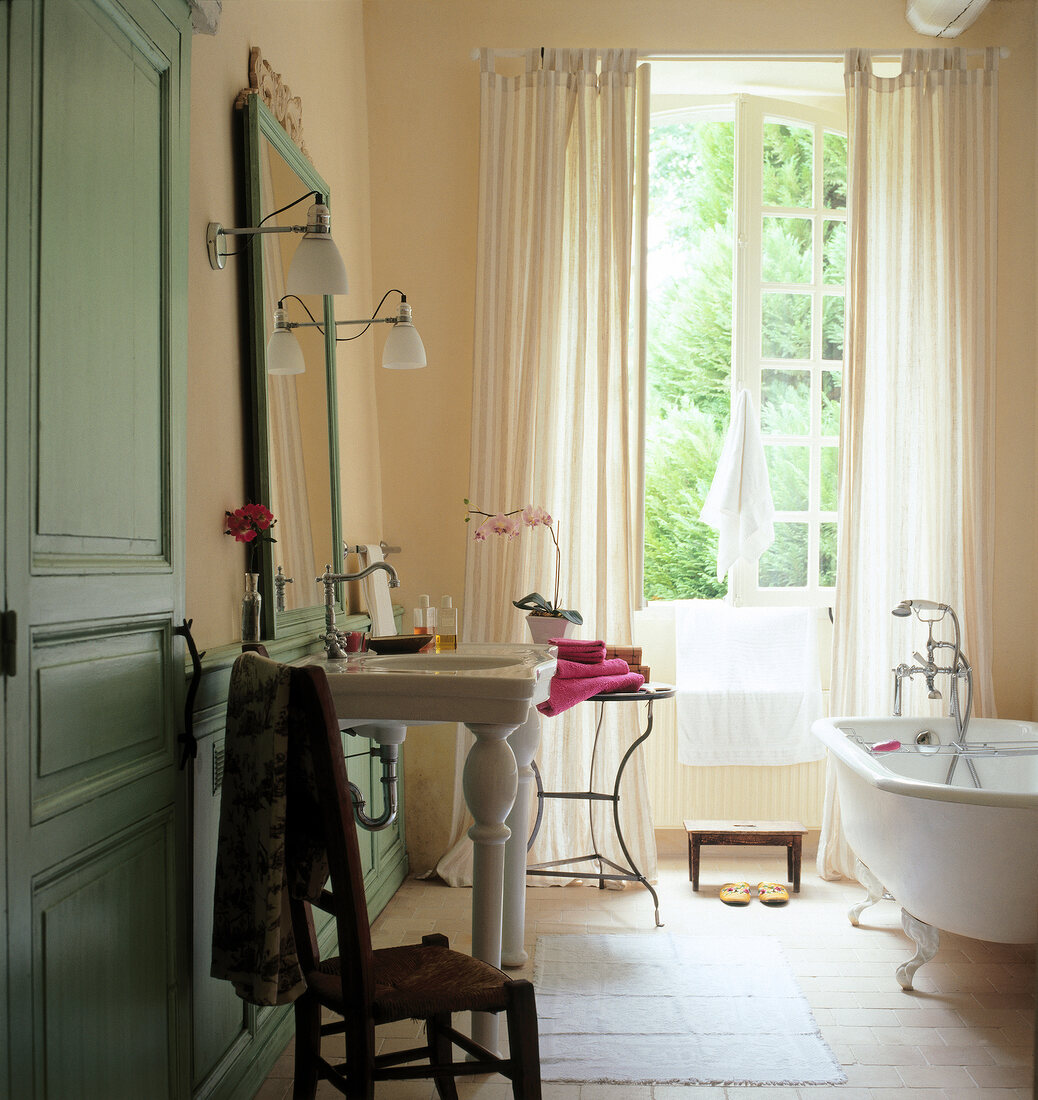 Bathroom with big window and freestanding bath