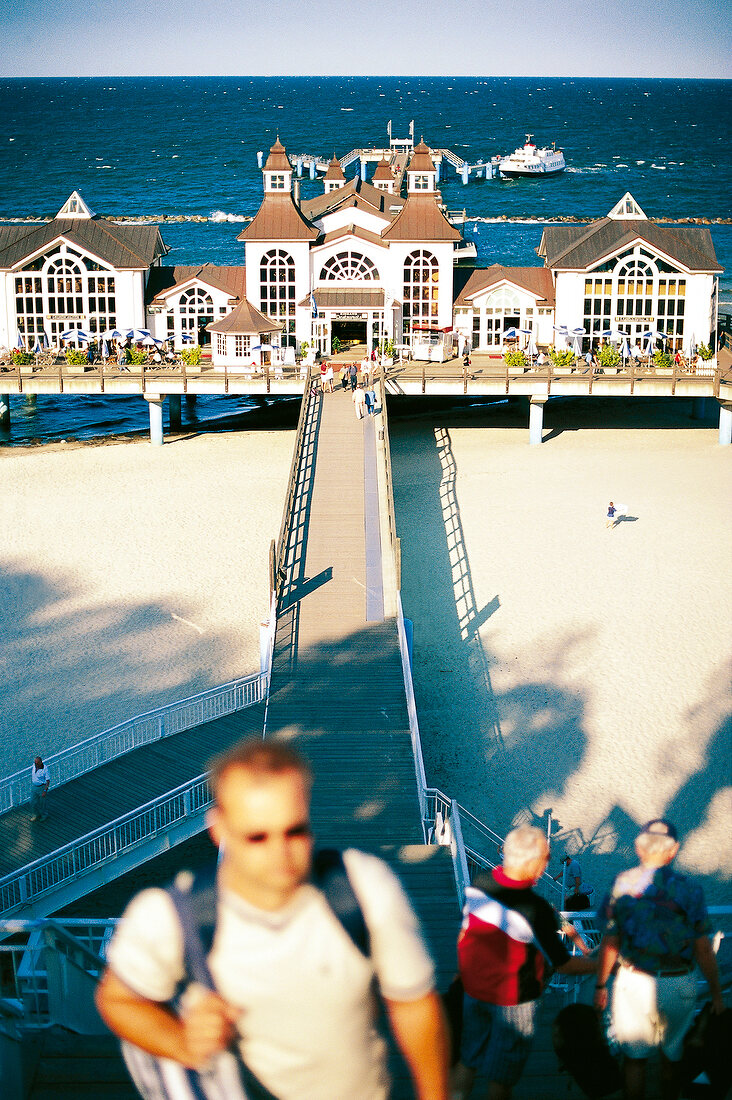 People in front of longest pier in Sellin on Rugen, Germany