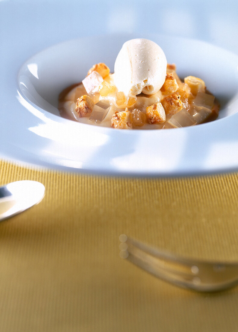 Close-up of pear tarte tatin on serving dish