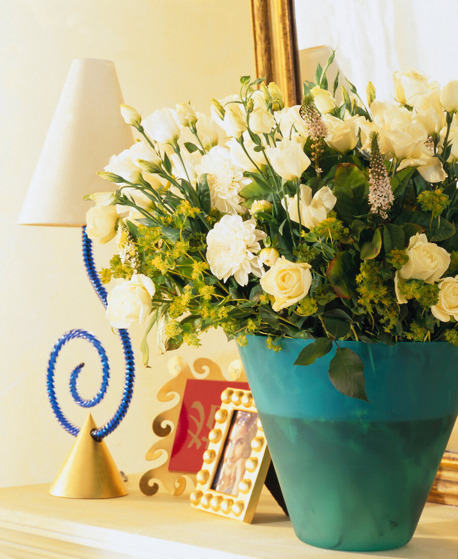 Summer bouquet with white flowers in blue vase
