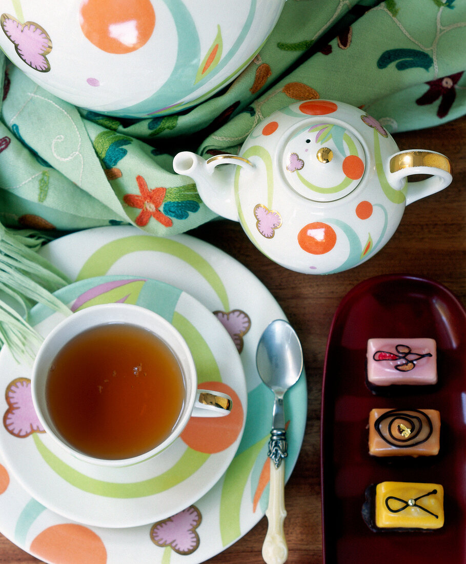 Colourful tea set, overhead view