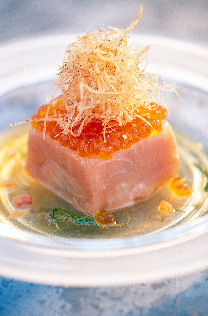 Close-up of Crab meat with roe and onion straw