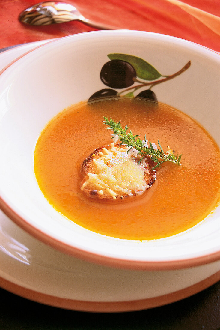 Close-up of tomato cream with cheese croutons in bowl