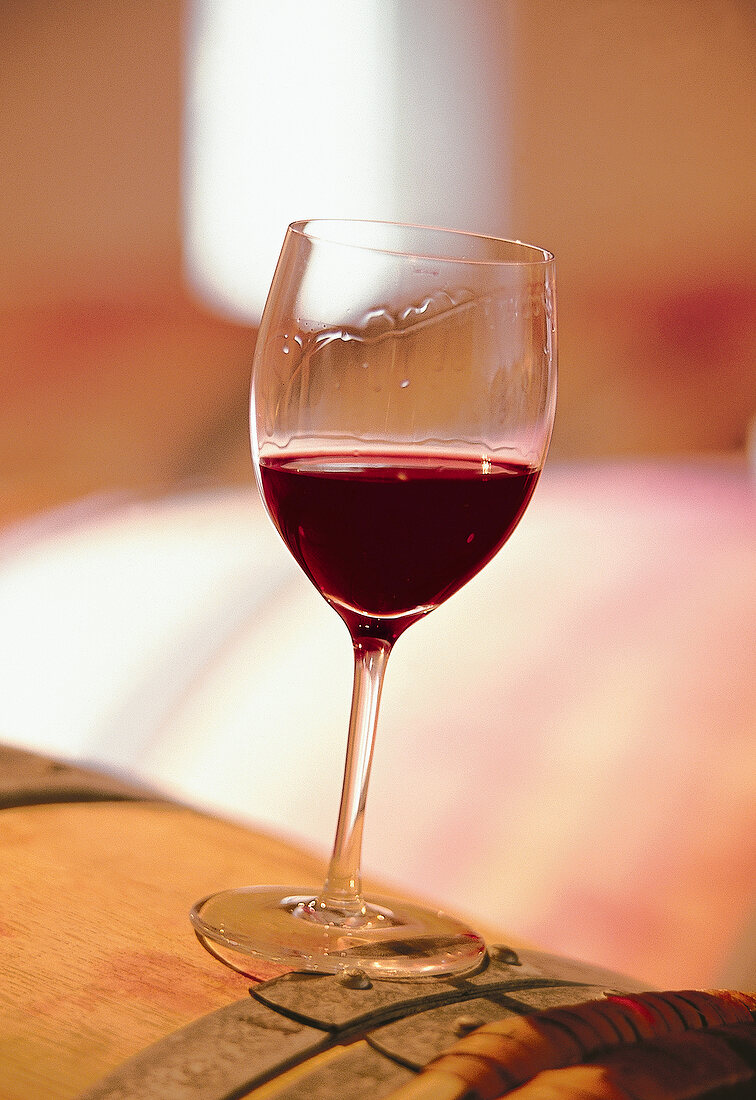 Close-up of glass of red wine made of merlot from Pomerol, Bordeaux, France