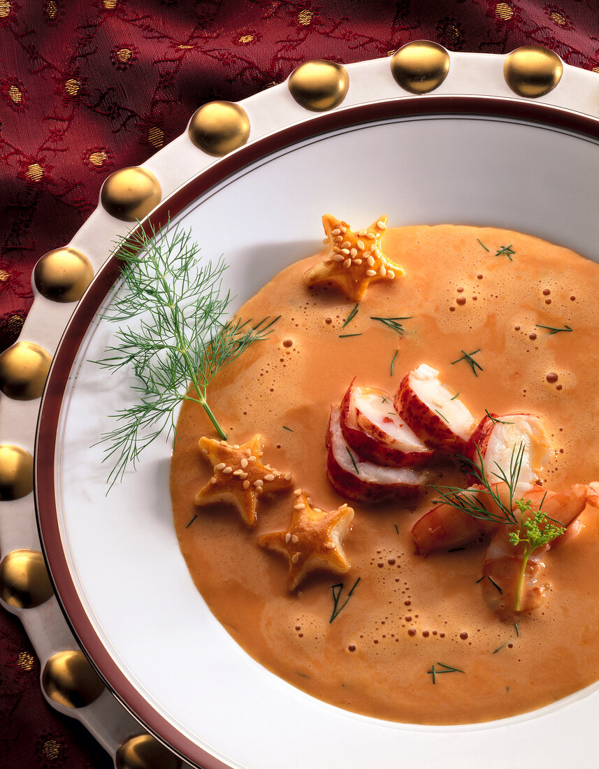 Lobster bisque in serving dish, overhead view