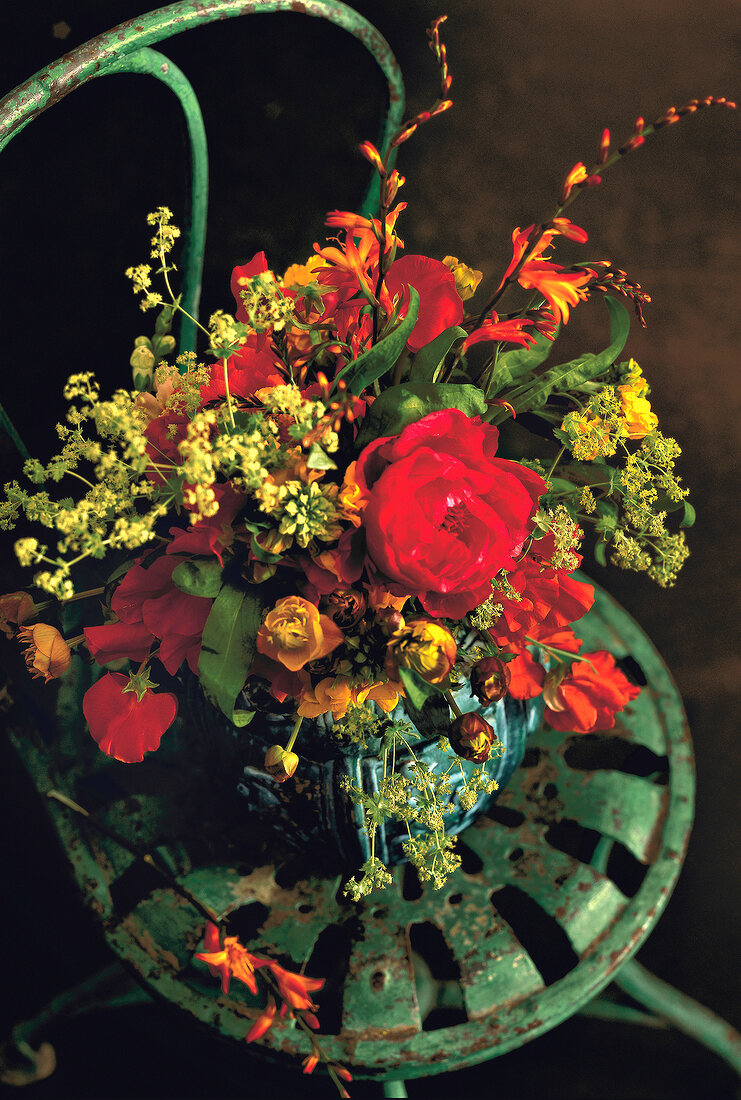 Bouquet of summer flowers in vase, overhead view