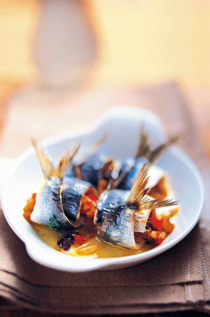 Close-up of stuffed sardines on plate