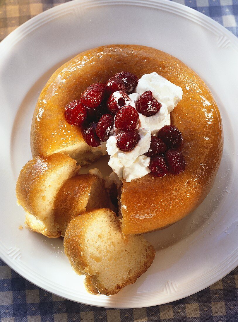 Savarin with raspberries & whipped cream