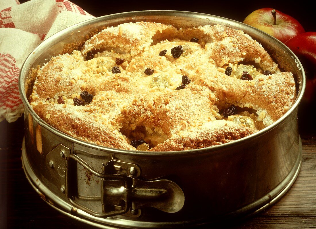 Sunken apple cake in the tin