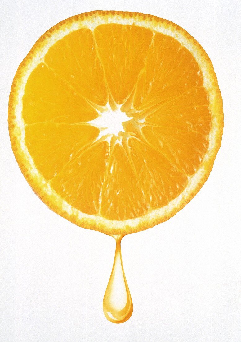 Orangenscheibe mit Orangensafttropfen