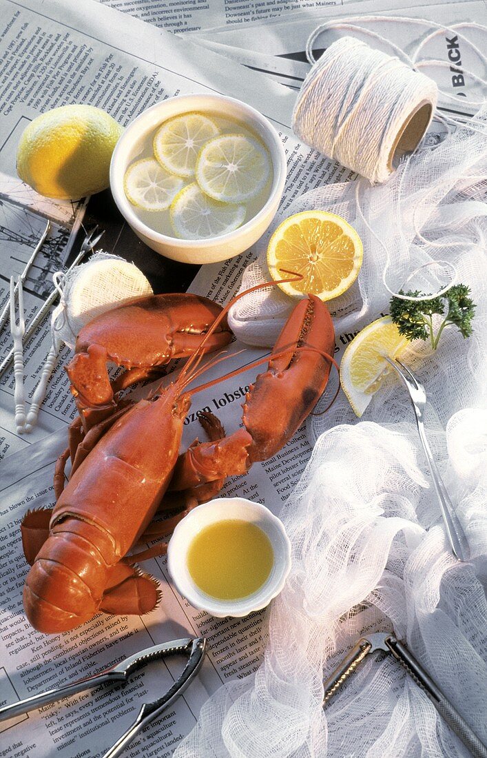 Whole Boiled Lobster with Lemon on Newspapers