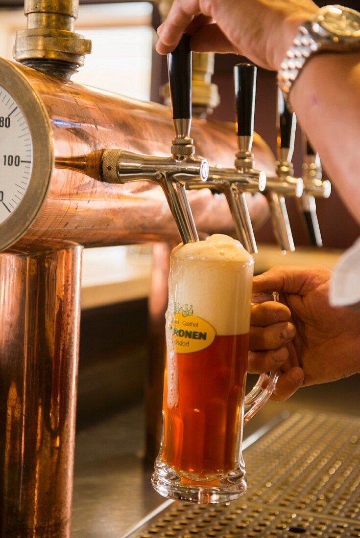 Beer taps in the brewery guesthouse Drei Kronen in Adelsdorf near Bamberg