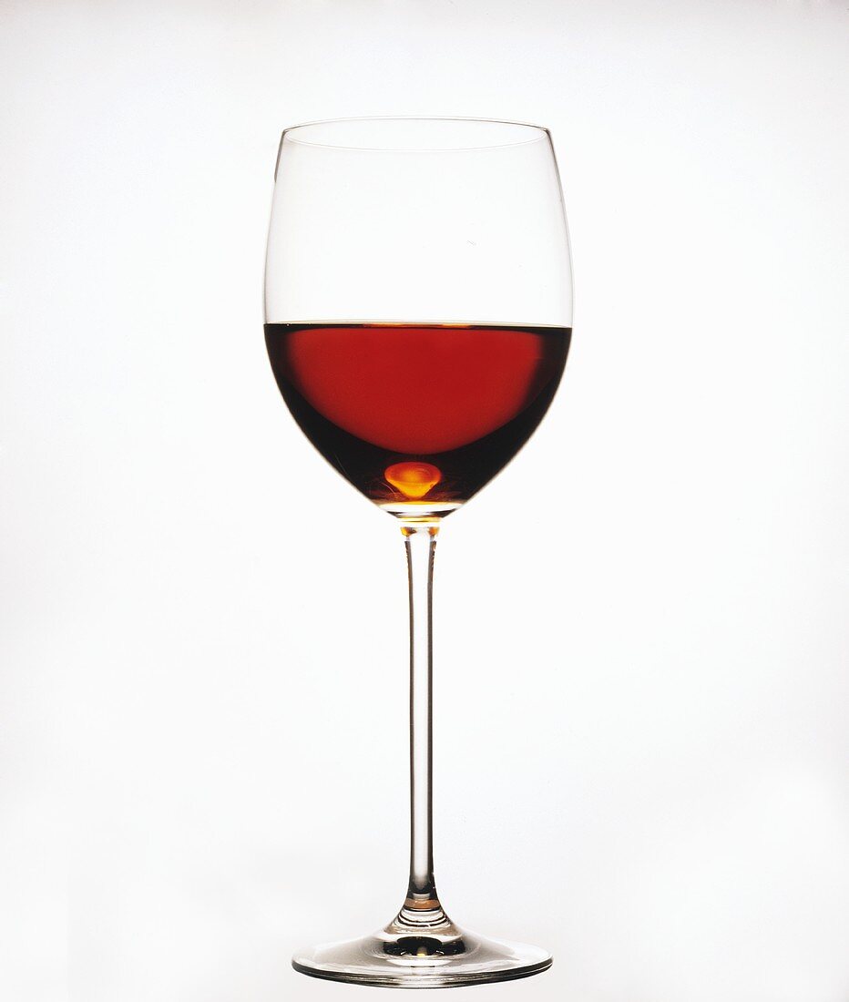 A Glass of strong Red Wine