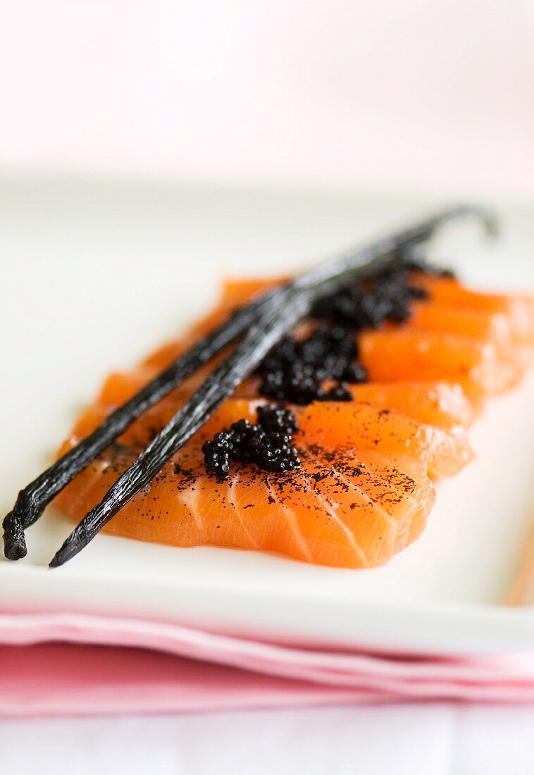 Salmon sashimi with vanilla and vodka dressing and caviar