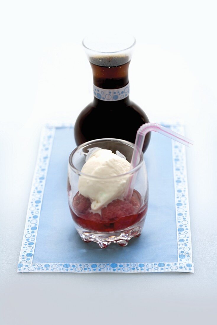 Coke float (vanilla ice cream with raspberries and cola)