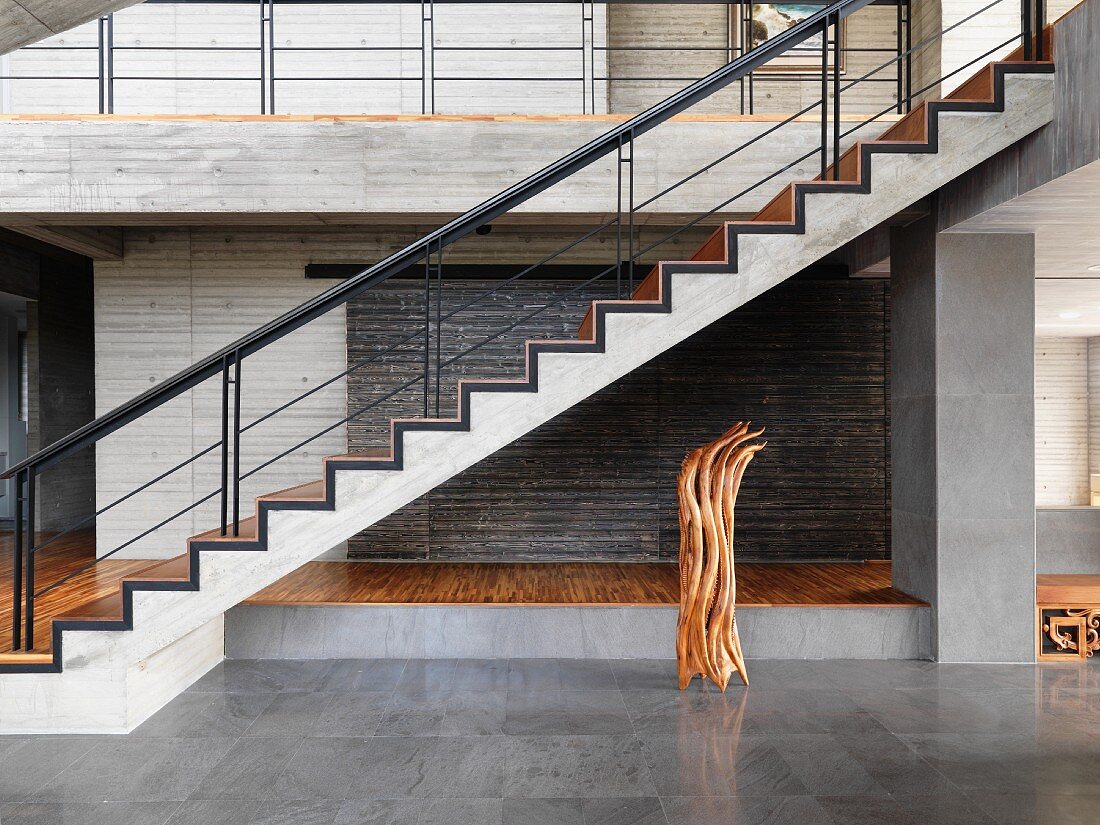 Modern hardwood covered cement staircase
