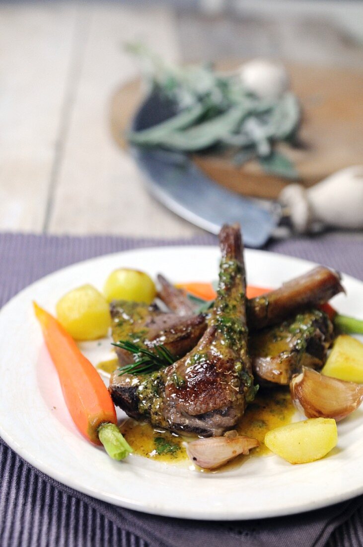 Lamb chops with potatoes, carrots and a parsley and mustard sauce