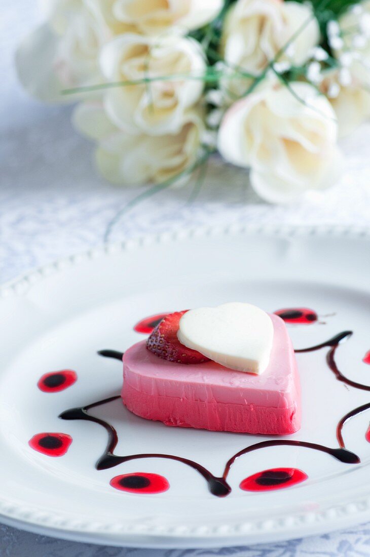 Heart-shaped berry mousse with vanilla jelly