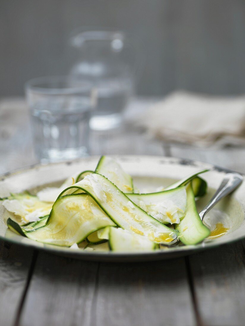 Sliced courgette with parmesan cheese