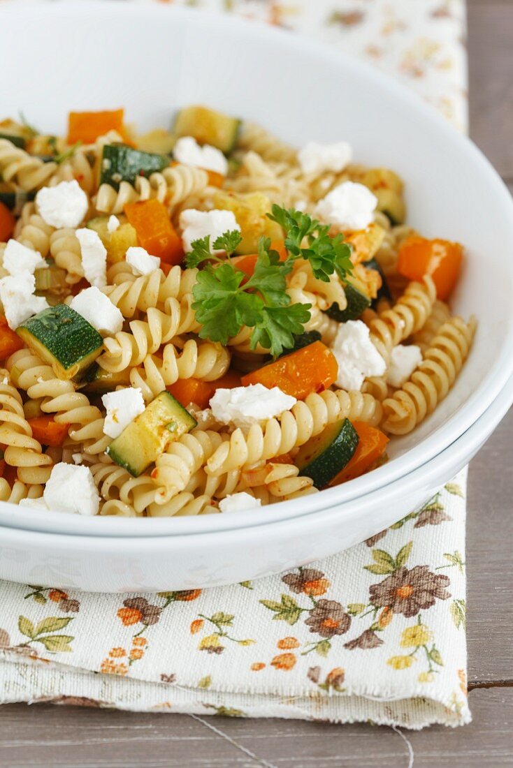Fusilli pasta with steamed courgette, pepper and sheep's cheese