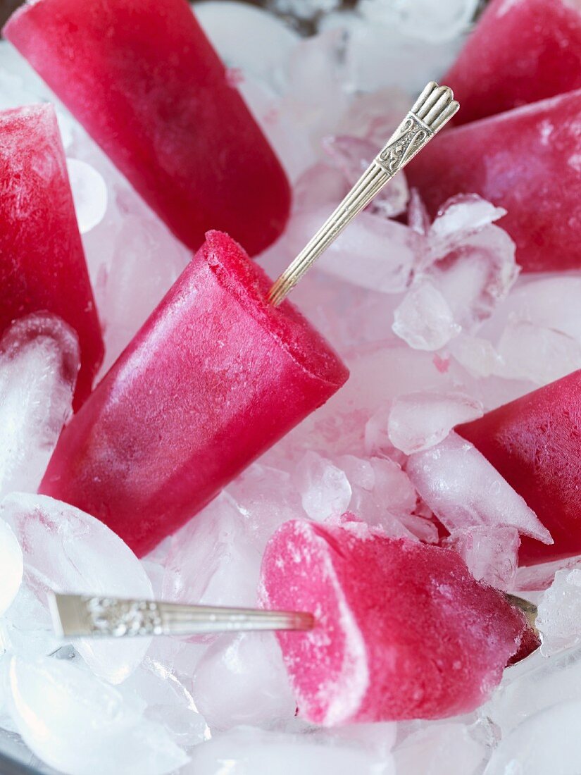 Fruit ice lollies on a bed of ice