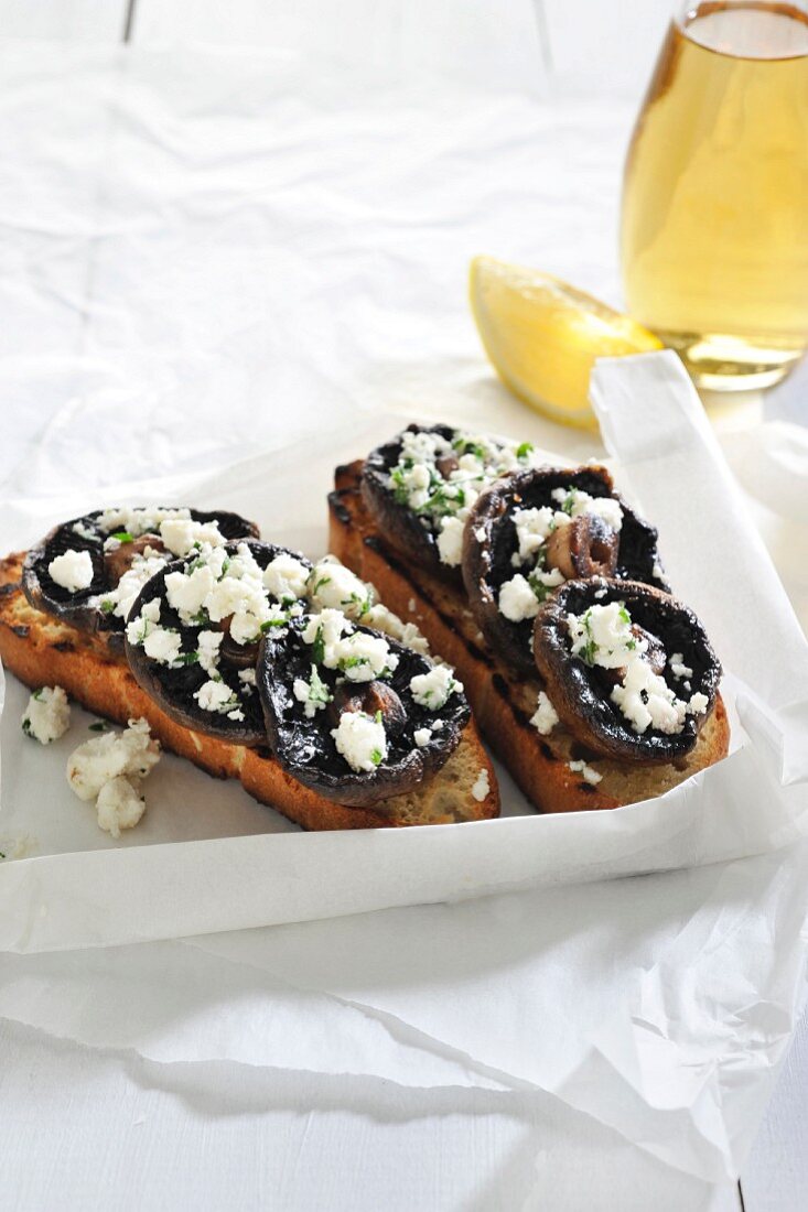 Bruschetta topped with mushrooms and ricotta