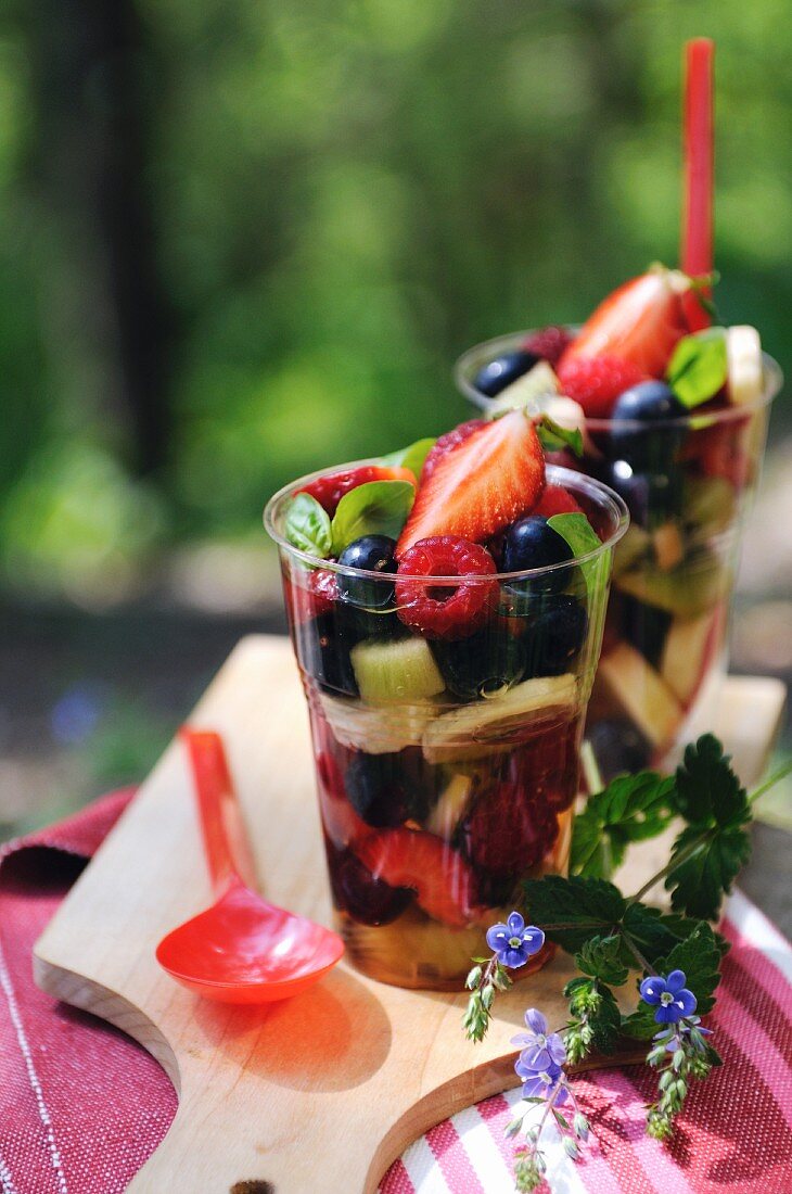 Fruit salad with basil and syrup