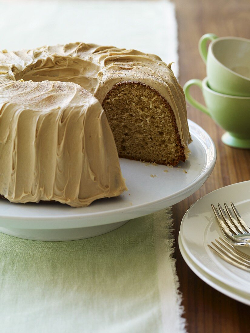 Frosted Coffee Cake with a Slice Removed