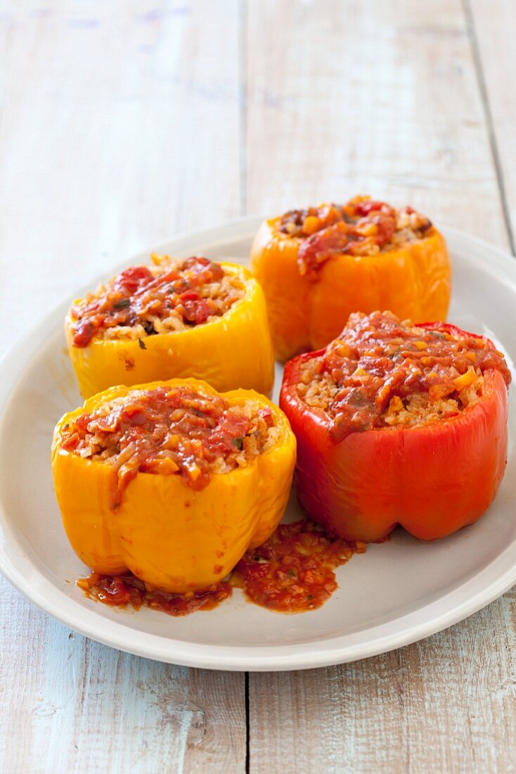 Peperoni ripieni (peppers with a rice and sausage filling and sauce)