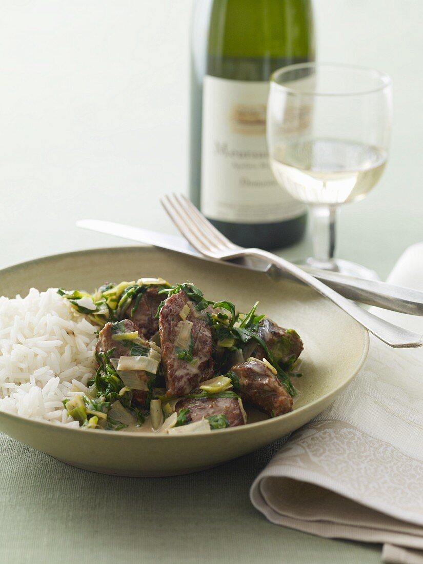 Beef and Wilted Greens with Rice; Fork and Knife; White Wine