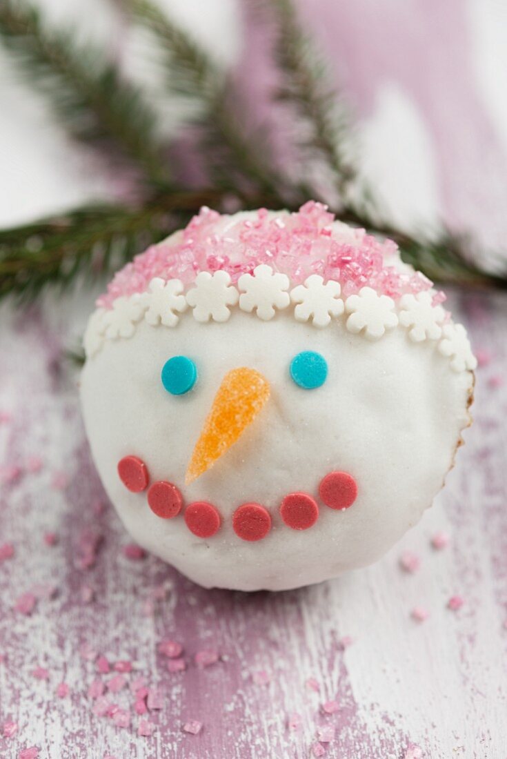 Cupcake mit Schneemann-Gesicht