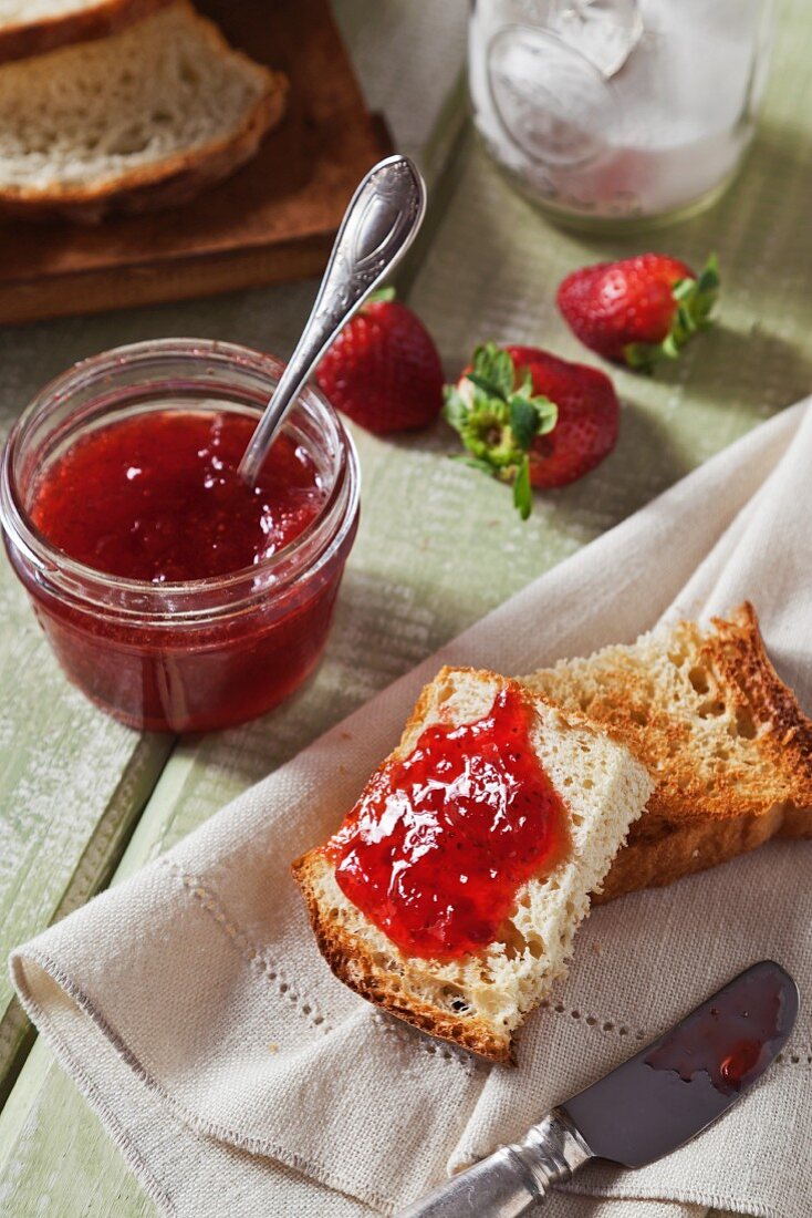 Homemade Strawberry Jam Spread Over Homemade Toasted Bread