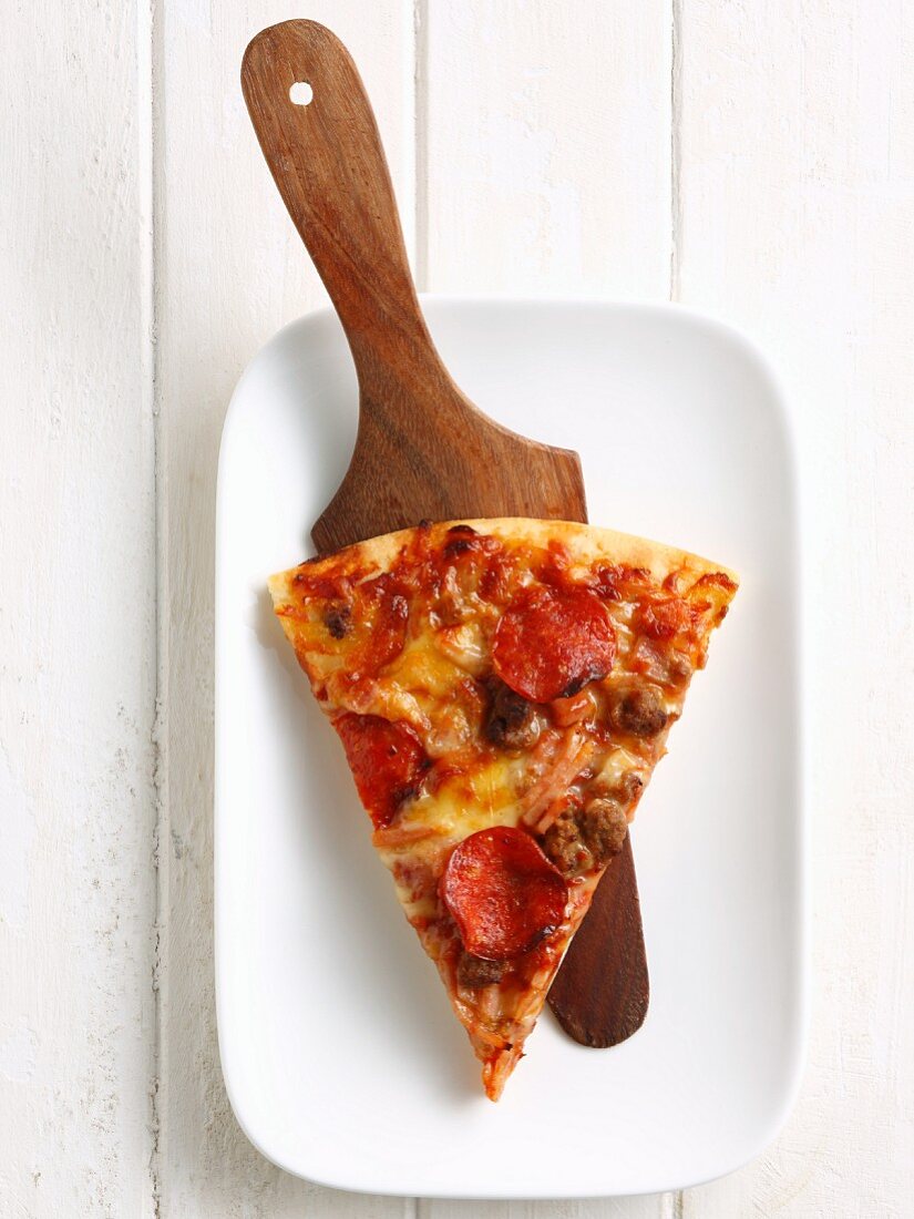 Slice of pizza on platter