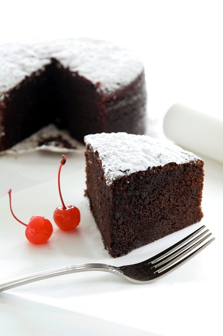 Moist chocolate cake dusted with icing sugar (Morocco)