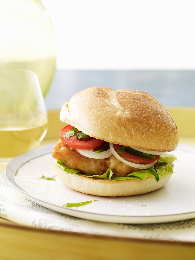 Fried Fish Sandwich with Onion, Tomato and Lettuce