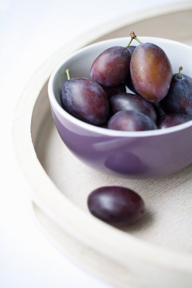 Plums in a Purple Bowl