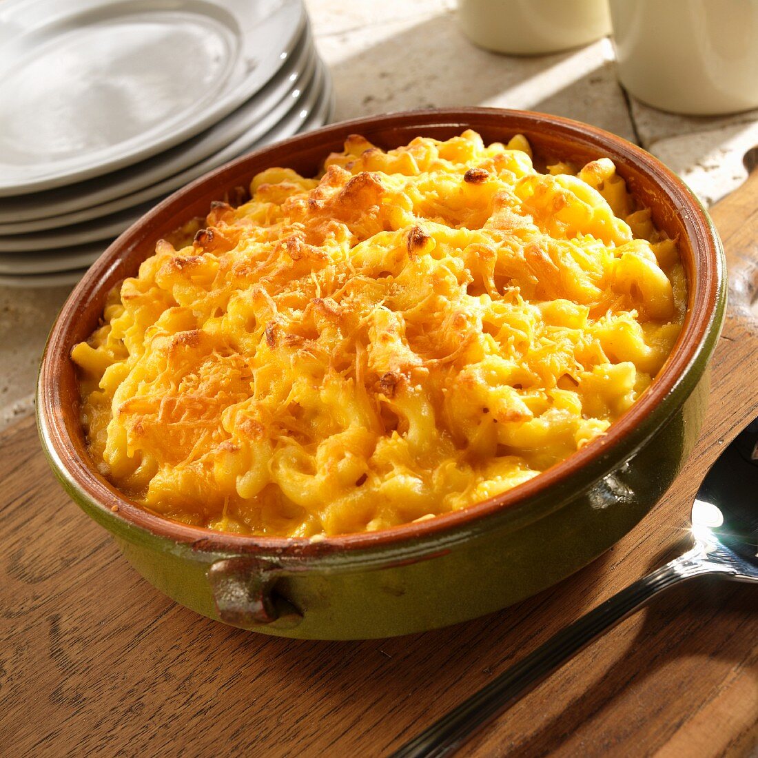Homemade Baked Macaroni and Cheese in a Green Baking Dish