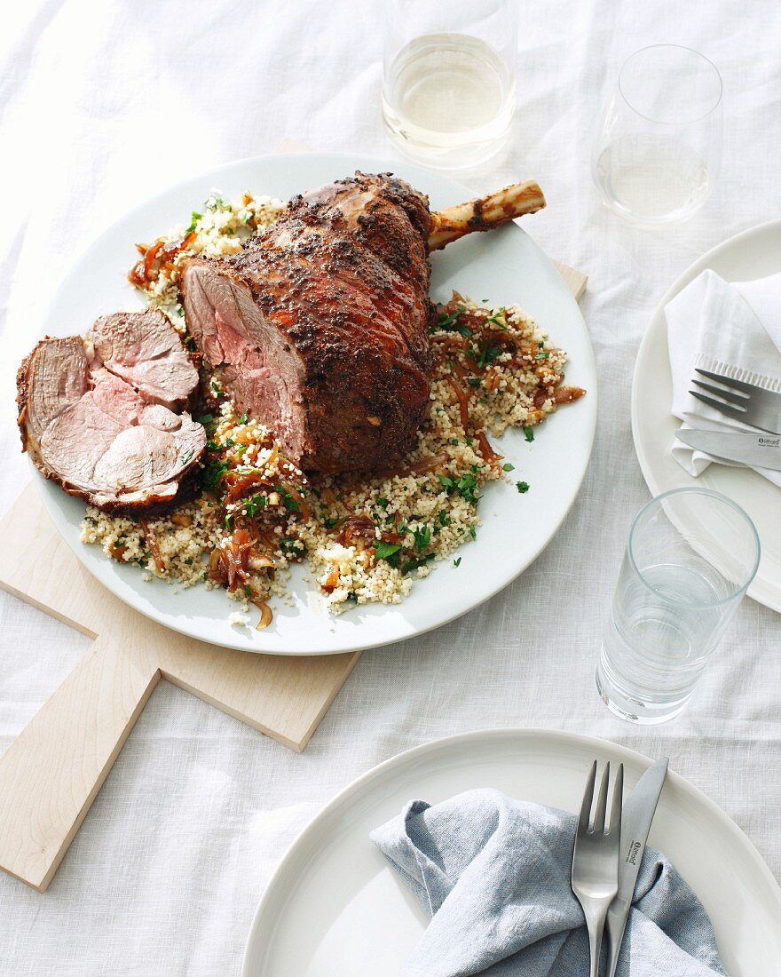 Plate of roast lamb and couscous