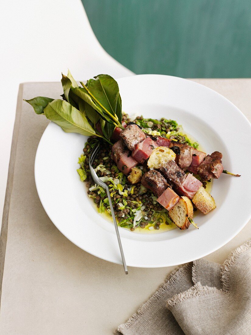 Plate of veal and bread skewers