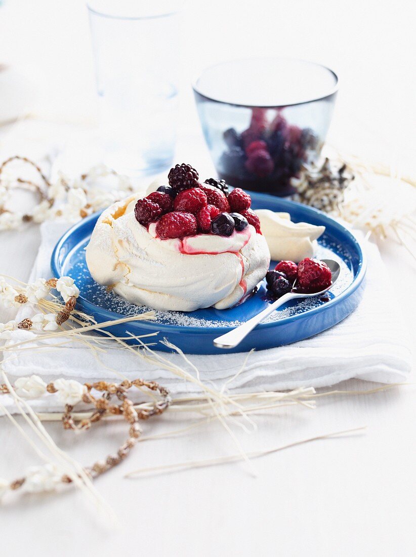 Plate of fruit meringue with cream
